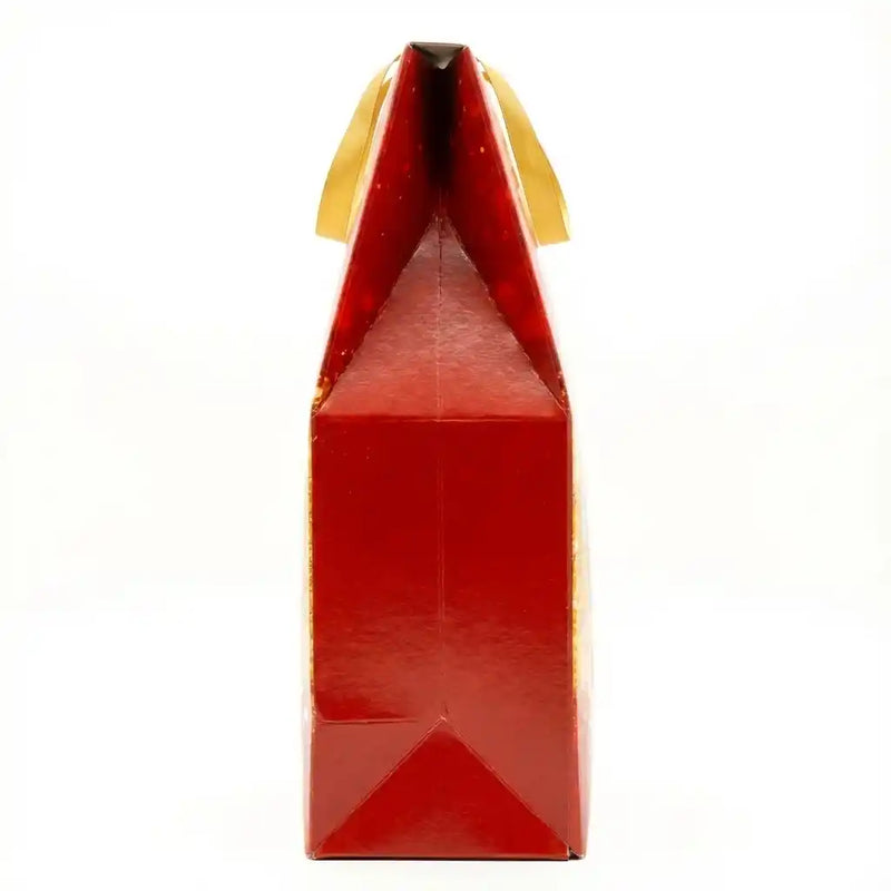 Contents of the Bauli Tanti Auguri pack including pandoro, Italian sparkling wine, and assorted sweets