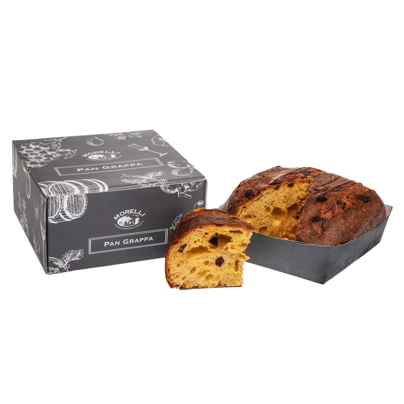 Panettone artisanal au chocolat noir et à la grappa, présenté dans une boîte noire avec des motifs d'ingrédients traditionnels toscans.